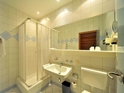 Single room, shower or bath, toilet